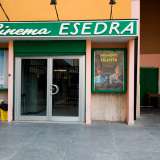 E infine con orgoglio ci porta davanti al fiore all�occhiello della comunit�: il cinema Esedra, posto accanto al luogo di culto